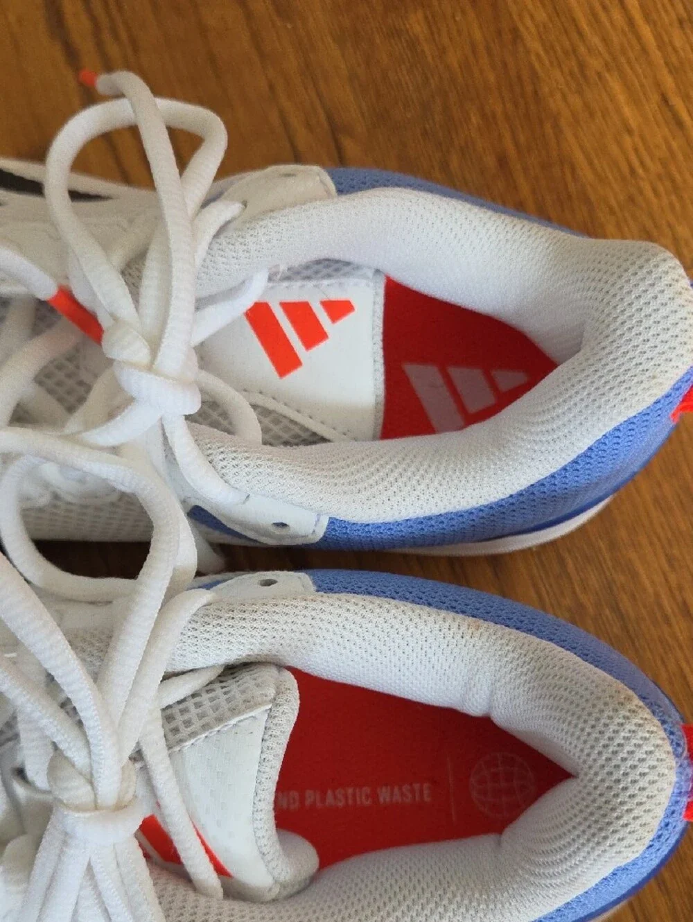 Adidas Kids White Sneakers with Blue and Black Accents